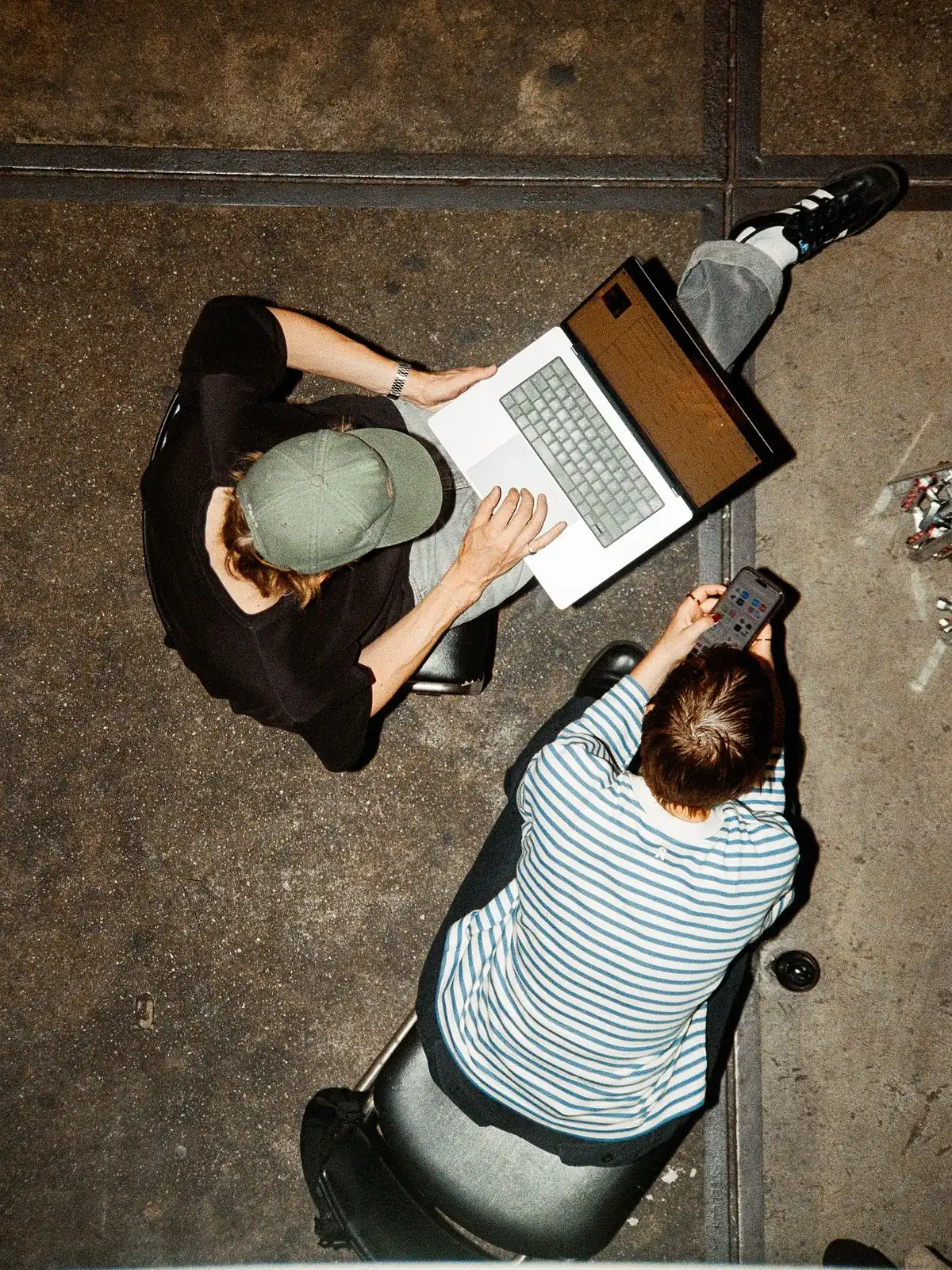 Person writing an email on a laptop